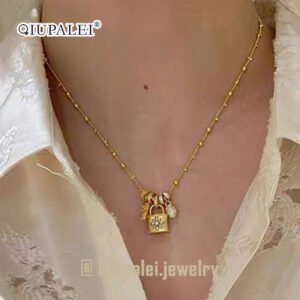 Holy Lock: QIUPALEI Gold Cross & Flower Lock Pearl Pendant Necklace