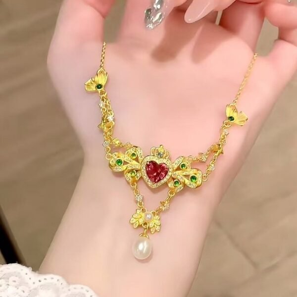 QIUPALEI | “Queen of Hearts” vintage court style necklace with delicate inlays and faux pearl embellishments for a romantic statement - Image 4